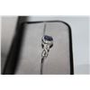Image 2 : STAMPED 925 STERLING SILVER NATURAL TANZANITE AND CUBIC ZIRCONIUM RING. TANZANITE 0.50 CARAT, OVAL