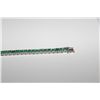 Image 2 : ONE LADIES STERLING SILVER EMERALD TENNIS STYLE BRACELET, SET WITH NUMEROUS ROUND SHAPE NATURAL