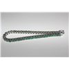 Image 3 : ONE LADIES STERLING SILVER EMERALD TENNIS STYLE BRACELET, SET WITH NUMEROUS ROUND SHAPE NATURAL