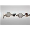 Image 2 : ONE LADIES STERLING SILVER MULTI-COLOURED STONE BRACELET. NUMEROUS CUSHION SHAPE CABOCHON CUT AND