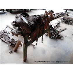 BROKEN DOWN SADDLE & WOODEN SAW HORSE