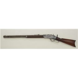 Winchester Model 1873 lever action rifle, .44W.C.F cal., 24” round barrel, blue finish, wood stock, 