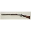 Image 1 : Winchester Model 1873 lever action rifle, .44W.C.F cal., 24” round barrel, blue finish, wood stock, 