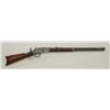 Image 3 : Winchester Model 1873 lever action rifle, .44W.C.F cal., 24” round barrel, blue finish, wood stock, 