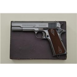 Colt Model 1911 commercial .45 caliber semi-automatic pistol remaining in near mint condition retain