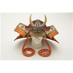 Japanese samurai style helmet with body or bowl consisting of many plates in sections with large for