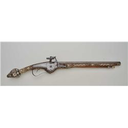 Wheelock pistol, circa 1600-1660 with Suhl markings; inlaid 19th Century by Spitzer in his typical s