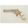 Image 2 : Stafford .22 caliber single shot derringer showing original silver and gold finish with pearl grips 