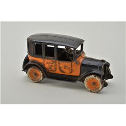 Antique cast iron child’s toy in the form of a yellow cab remaining in very good condition with abou