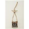Image 2 : Kroll medicine pouch with beaded decoration good condition hung from an old boiled vertebrae bone ve