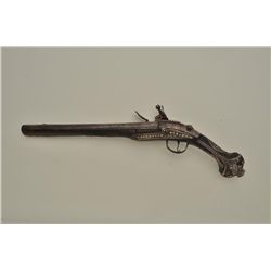 High quality silver mounted mid-eastern flintlock pistol with niello silver decoration, small coral 