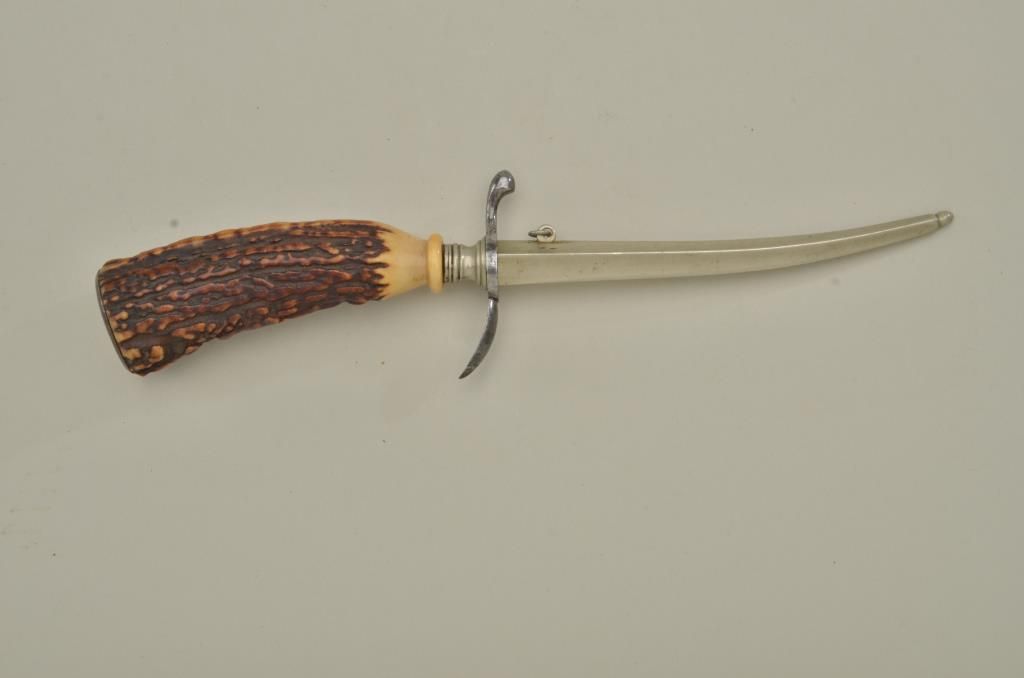 Triangular blade knife with stag grip, approx. 10” overall with a 5