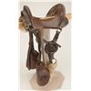 Image 2 : U.S. McClellan Saddle with an 11-1/2” seat in overall good condition with wood stirrups and leather 