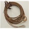 Image 2 : Old woven hide lariat in used but overall good condition. Gale Kennedy Historical West. Est.: $100-$