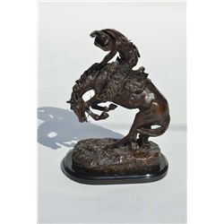 Well-done older copy of Frederic Remington’s “Rattlesnake” bronze with fine detail and beautiful dee