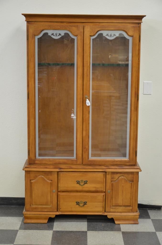 Hardwood gun with etched glass doors approx. 74” in height