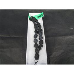 16 inch strand of drilled genuine meteorites