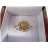 Image 2 : Rare yellow diamond cluster ring.