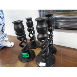 Four black candlesticks