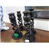 Image 1 : Four black candlesticks