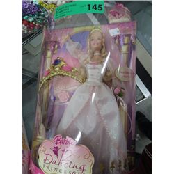 Two dolls, in  original boxes