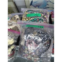 Two large bags of beads and costume jewelry