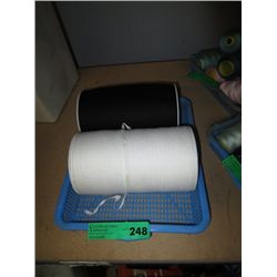 Two large spools of seam tape