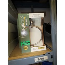Five brushed nickel wall mount towel rings