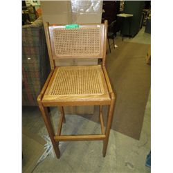 Bar stool with wicker seat
