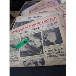 Assorted vintage newspapers