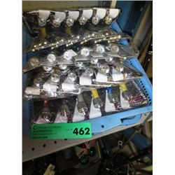 Tray of keychain flashlights, electric outlets