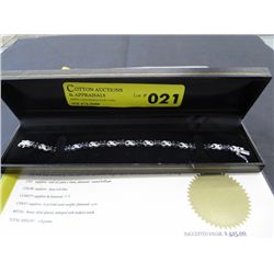 Sapphire & diamond tennis bracelet.