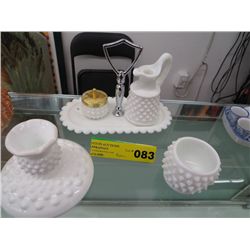 Four pieces of white glass