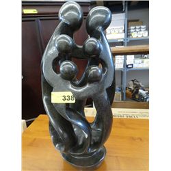 Carved family circle statue 19" tall