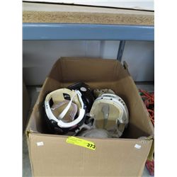 Eight hockey helmet and one baseball helmet