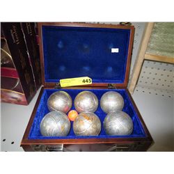 Metal bocci balls in case