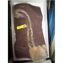 Pair of new wedge heel winter boots