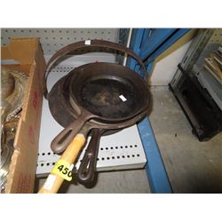 Three cast iron pans