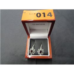 Sterling silver garnet earrings. Brand new