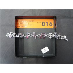 Musical note charm bracelet