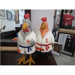 A pair of Kung Pao chicken statues from Earl's