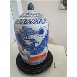 Oriental lidded vase on a stand