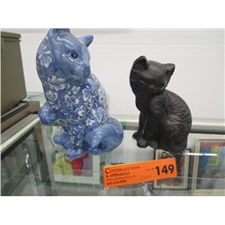Two cat figurines