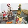 Image 1 : Four clown statues