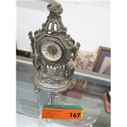 Wind up metal clock 9" tall