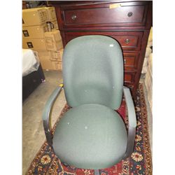 Green swivel office chair