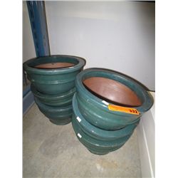 Six green clay planter pots