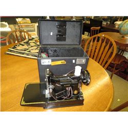 Antique portable Singer sewing machine