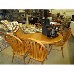 Oval table with leaf and six chairs