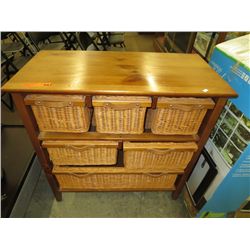 Wooden dresser with wicker drawers